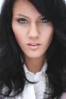 Gina's chiseled face looks very soft with her wavy hair, along with her eyes popping. Gina-Hair and Makeup Model