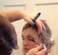 Bridal makeup being done by Christine on location in Birmingham, Michigan. Leah-Bride