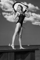 A big floppy hat at the beach is a must have, and her updo still looks beautiful! Mackenzie-Hair and Makeup Model
