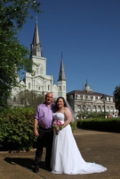 A half-up, half-down 'do looks goes well with her natural makeup on Erin for her big day in the French Quarter of New Orleans. Erin-Bride