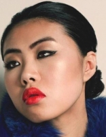 Illuminating skin, red lips, and modern day cat eyes go great with this slicked back bun. Lexie-Hair and Makeup Model